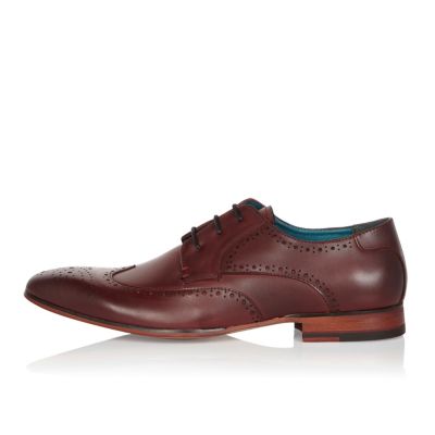 Dark red leather brogues